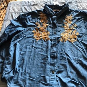 Long sleeve blue shirt with designs